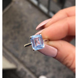 ANELLO TAGLIO SMERALDO OTTAGONALE CON PIETRA AZZURRA