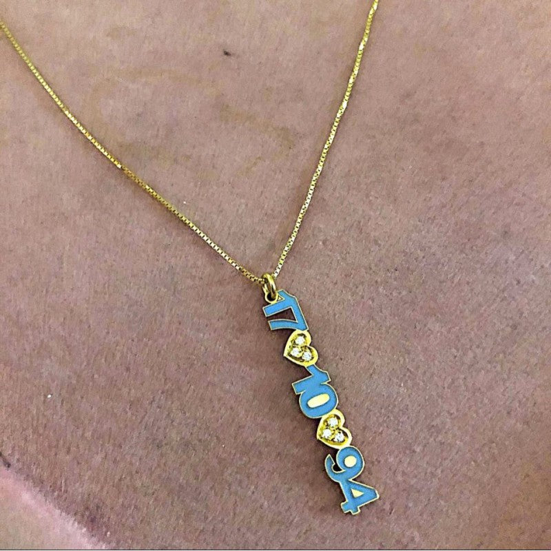 COLLANA CON DATA SMALTATA E CUORI ZIRCONATI